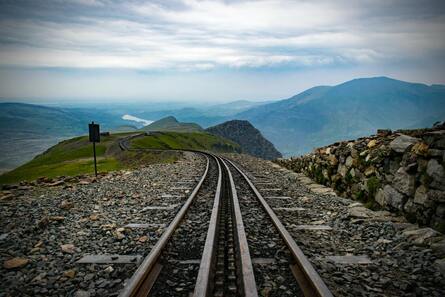 A photograph of the tracks leading down the Snowdonia Mountain Railway