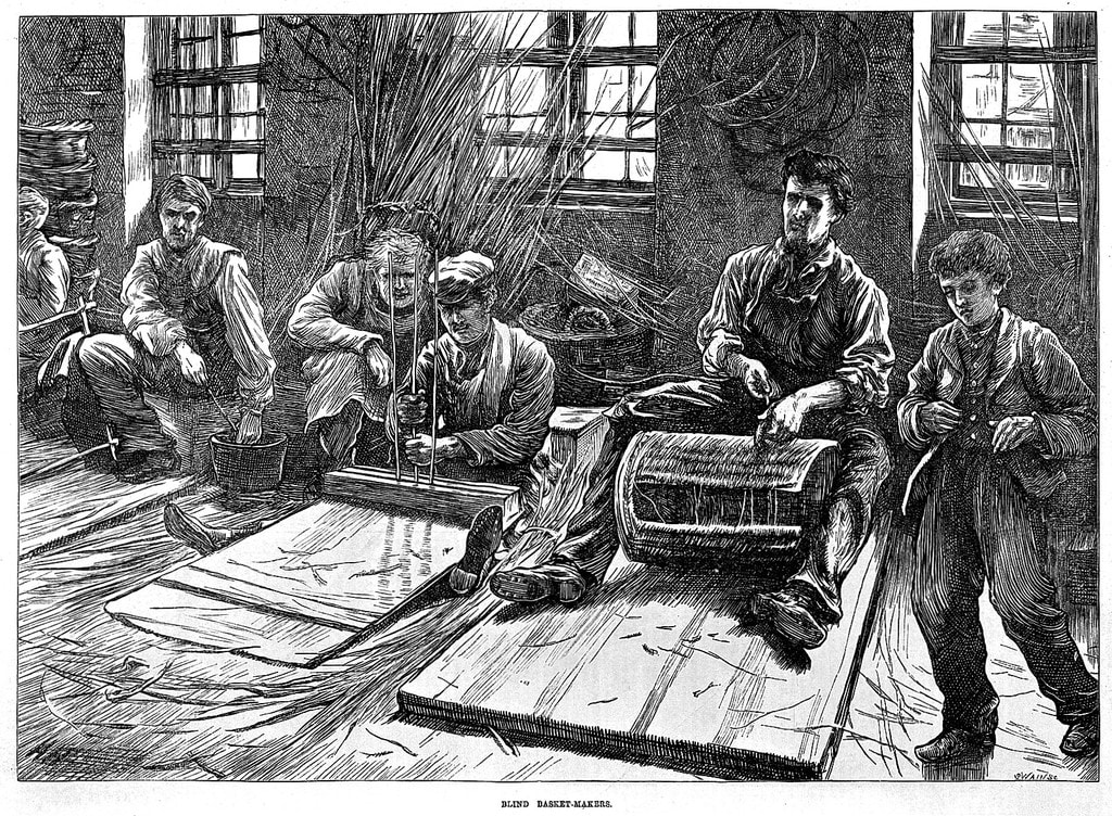Victorian illustration of blind people in an institition sitting on a bare wood floor making baskets by hand